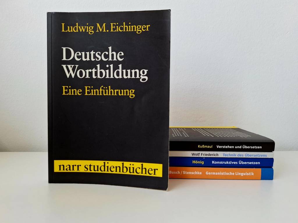 Bücher über die Übersetzung von Komposita, die zum Teil erklären, wieso Übersetzungen ins Portugiesische teurer sind